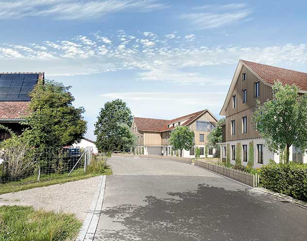 Wohnbau Hamisfeld, Hefenhofen TG Stoffel Schneider Architekten AG Die beiden Baukörper positionieren sich lose auf dem lang gestreckten Grundstück am Siedlungsrand von Hamisfeld.  Sie orientieren sich an der freien Ordnung der Nachbarbauten, nicht aber am Strassenverlauf oder an den Parzellengrenzen und ergänzen das Siedlungsgefüge. Beide Neubauten greifen den Winkel, die Dachform sowie die Volumetrie in Bezug auf die Gebäudetiefe des gegenüber liegenden Bestandsbau auf und führt die Körnung der Siedlungsstruktur weiter. Die Winkel der Neubauten verbindende sich über die Strasse hinweg mit den Aussenräume der Bestandsbauten. Die Kreuzgiebel positionieren sich rhythmisch zueinander und ergeben eine Gliederung der Zwischenräume. Zwischen den Neubauten hindurch bleibt die offene Landschaft erkennbar. Ein Zaun begleitet die Strasse und fasst die Vorgärten mit Blumenbeeten in Anlehnung an die Bauerngärten.  Die Wohnräume öffnen sich über die Eckloggien zur Landschaft. Den Erdgeschosswohnungen wird über wenige Treppenstufen ein angemessener Privatbereich in der Umgebung zugeteilt. Eine Baumreihe aus unterschiedlichen Obstbäumen staffelt den Übergang zur offenen Landschaft.